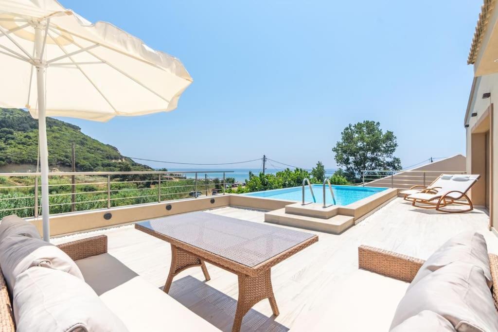 Villa Vasillis-Heated Swimming Pool With Infinity View Vitalades Exterior photo