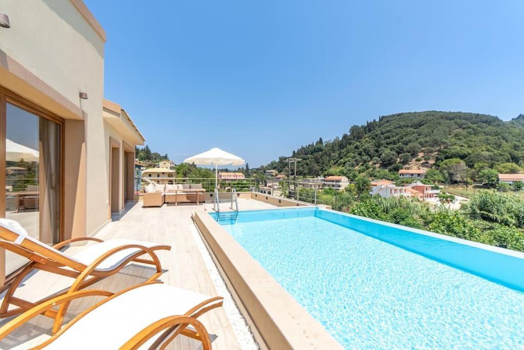 Villa Vasillis-Heated Swimming Pool With Infinity View Vitalades Exterior photo
